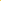 Hand holding Creme Of Nature Argan Oil Treatment bottle against yellow background with usage instructions for damp or dry hair