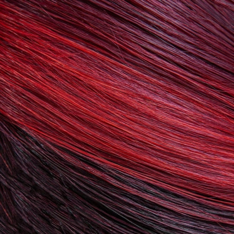 Close-up of OUTRE synthetic lace front wig 12 inch hair strands in red and black shades