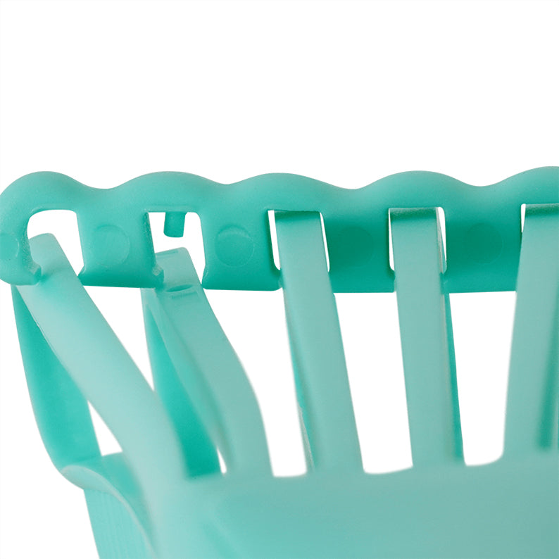 ANNIE vented detangling brush in teal closeup showing flexible wide tines and ventilated design for fast drying