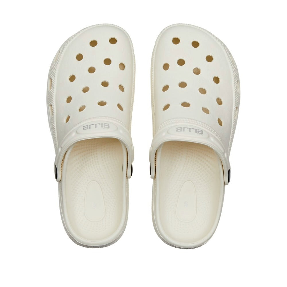Top view of white air clog shoes with ventilation holes adjustable heel strap textured footbed
