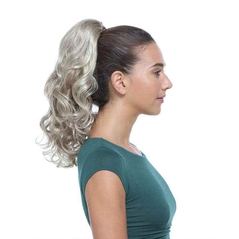 HAIR COUTURE drawstring ponytail with claw clip ash blonde wavy extension on model high sleek pony