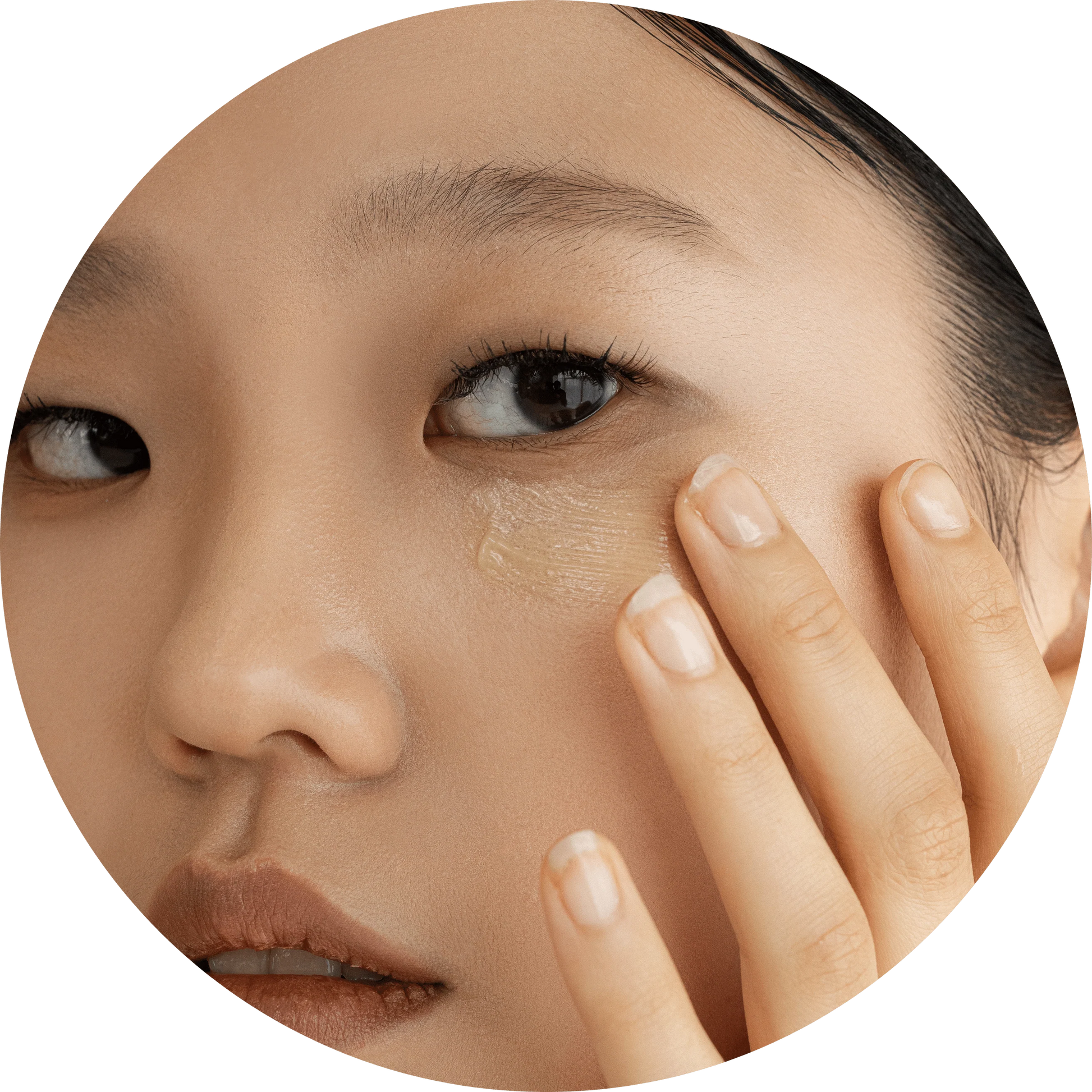 Beauty of Joseon model applying ginseng retinal eye serum under eye to hydrate and brighten