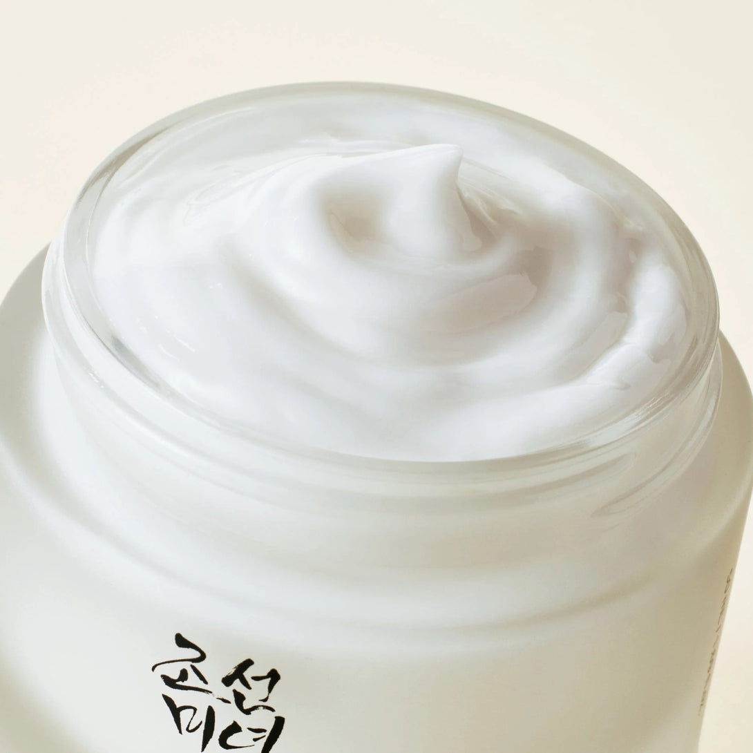 Beauty of Joseon Dynasty Cream moisturizer in open glass jar showing smooth whipped white cream