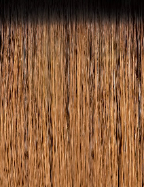 OUTRE synthetic curly half wig close up of light brown ombre fibers with dark roots shown straight