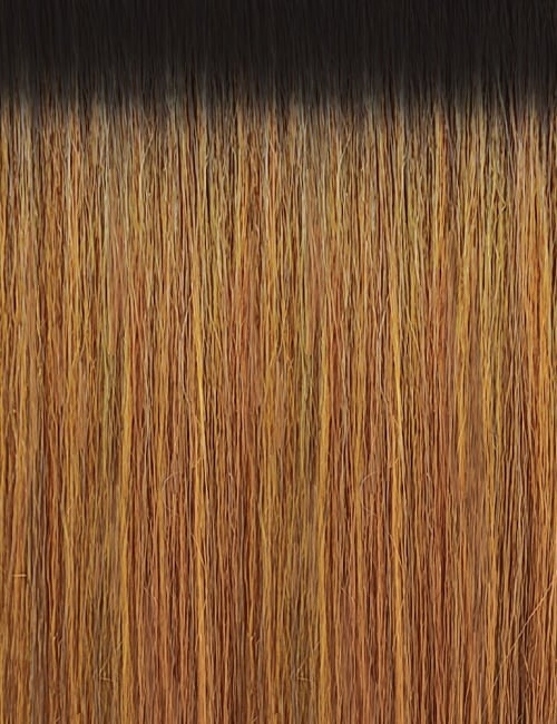 OUTRE synthetic curly half wig shown straightened in ombre dark roots to honey blonde close up texture