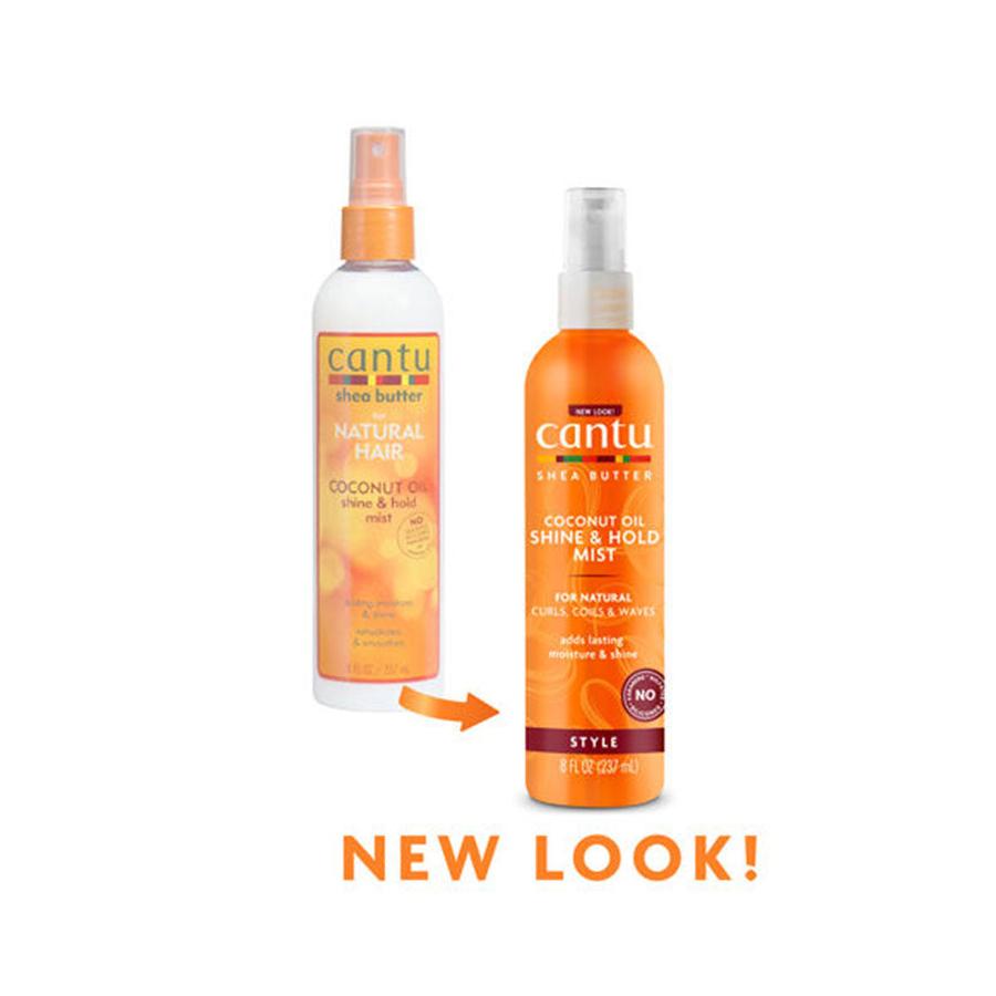 Cantu coconut oil shine spray for curls in old and new orange spray bottles showing updated packaging