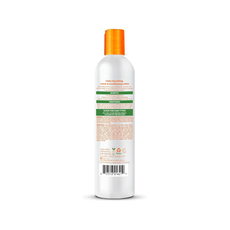 Back view of Cantu shea butter leave-in conditioner in white bottle with orange cap and detailed label