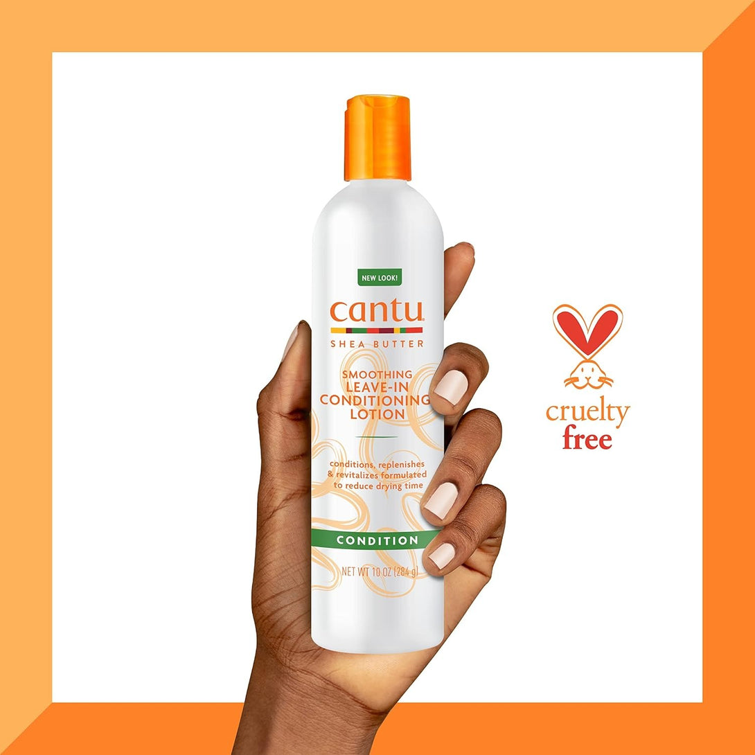 Cantu shea butter leave-in conditioner bottle held in hand with cruelty free logo