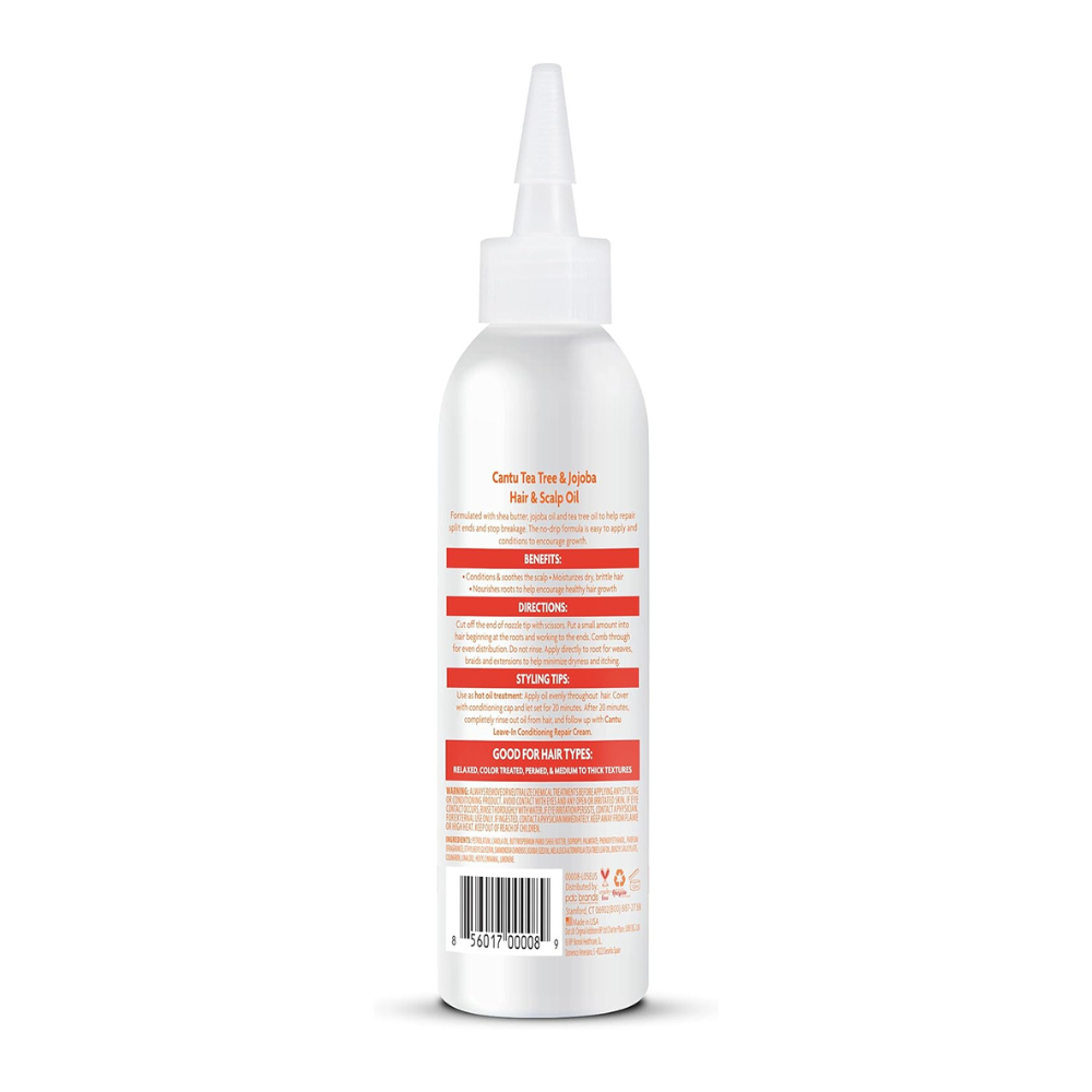 Cantu shea butter scalp oil in white bottle with applicator tip for hair care