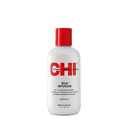 CHI white bottle of Chi Silk Infusion hair treatment with red cap 5 fl oz salon reconstructing formula