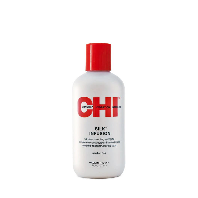 CHI white bottle of Chi Silk Infusion hair treatment with red cap 5 fl oz salon reconstructing formula