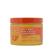 Creme of Nature argan oil day and night hair and scalp conditioner in yellow jar with orange lid