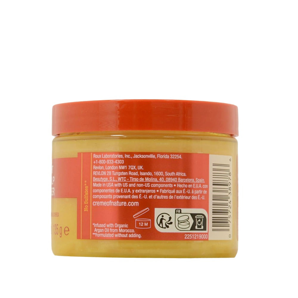 Creme of Nature day and night hair and scalp conditioner jar with orange lid showing back label