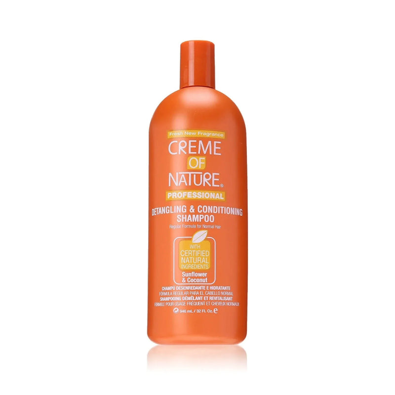 CREME OF NATURE detangling and conditioning shampoo orange professional bottle with sunflower and coconut