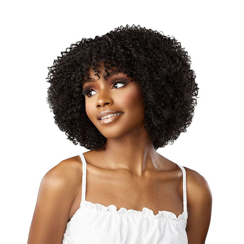 SENSATIONNEL curly bob lace front wig in natural black on model with voluminous tight curls and bangs