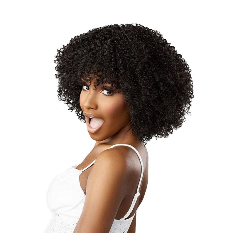 SENSATIONNEL curly bob lace front wig on model with short tight black curls and fringe in white tank top