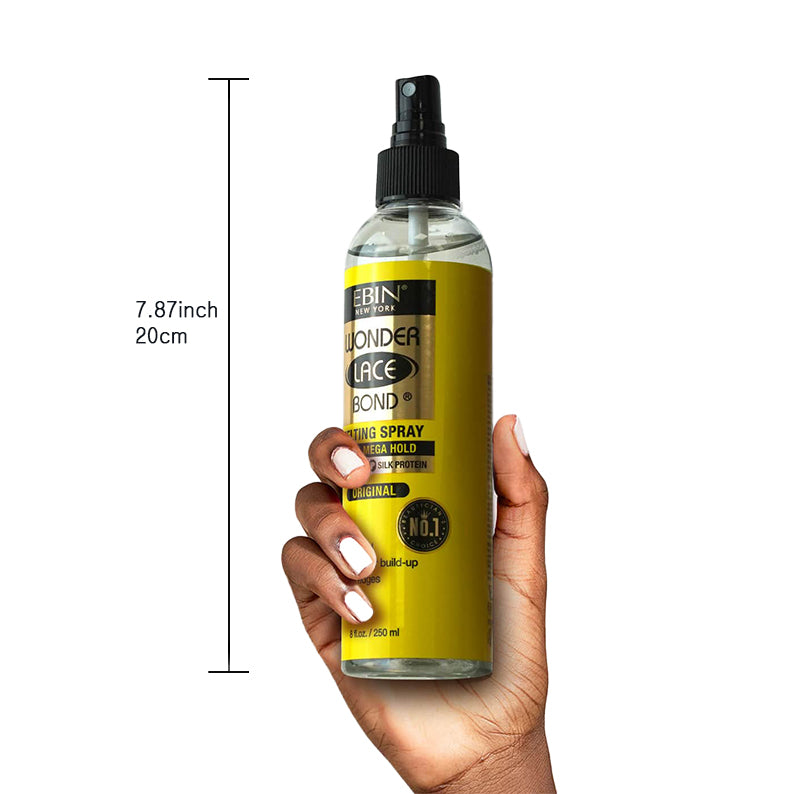 EBIN Wonder Lace Bond extra mega hold lace wig spray bottle held in hand with 8 inch measurement