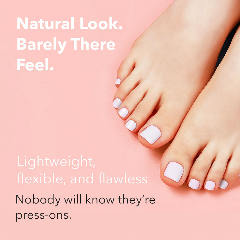 EBIN hot pink press on toenails ad showing model feet wearing light pastel pink press ons on pink background