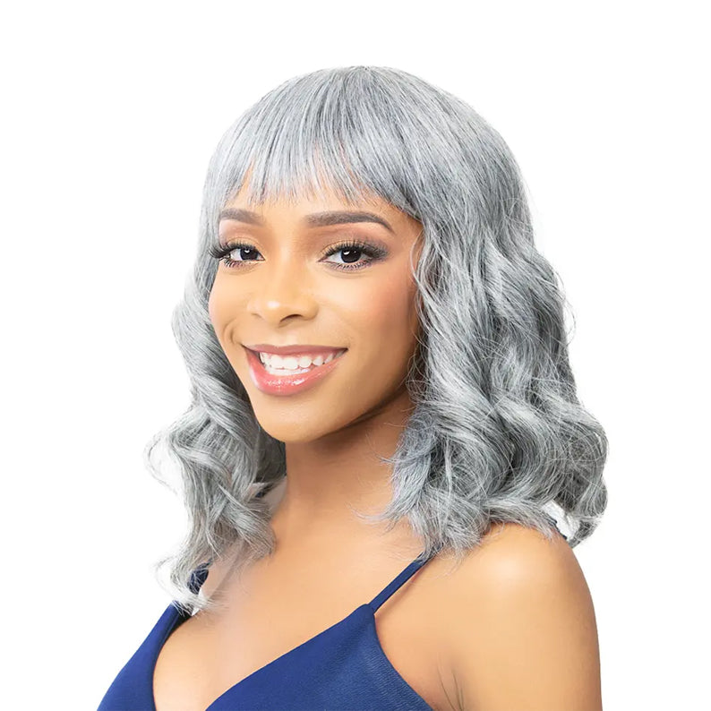 ITS A WIG premium synthetic wig with bangs silver wavy shoulder length bob on smiling model