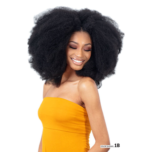SHAKE N GO pre-fluffed poppin twist braiding hair in color 1B styled on woman with natural afro