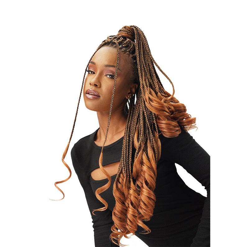 Royal Imex French curl braid hair extensions in long brown and caramel curls styled in a high ponytail