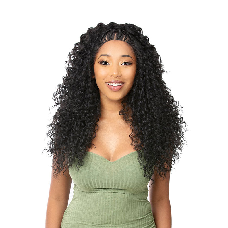 Model wearing black curly HD lace braided wig with braided front hairline and voluminous shoulder length curls
