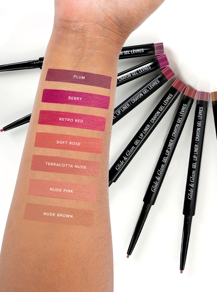 Absolute New York gel lip liner for smooth application swatches on forearm showing seven shades and retractable pencils