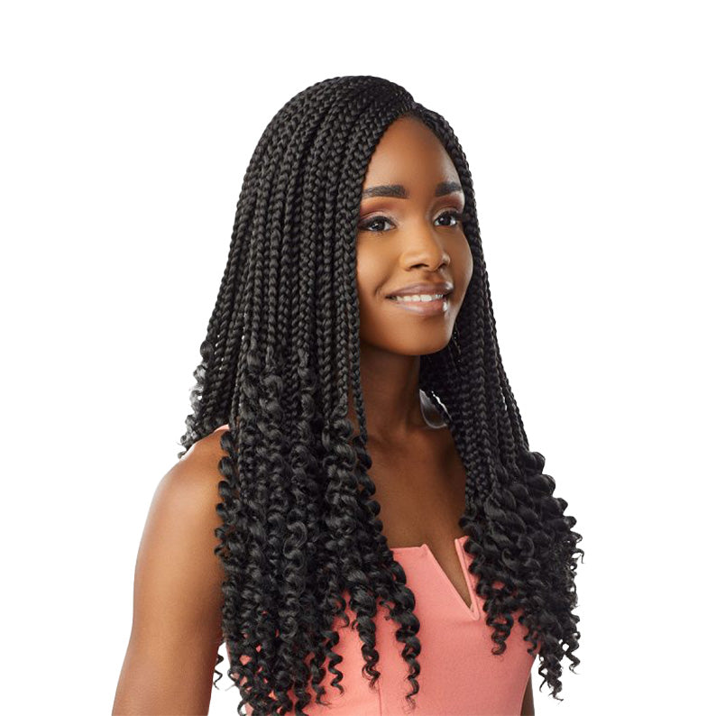 Sensationnel goddess box braids 18 inch with curly ends worn by woman in pink top