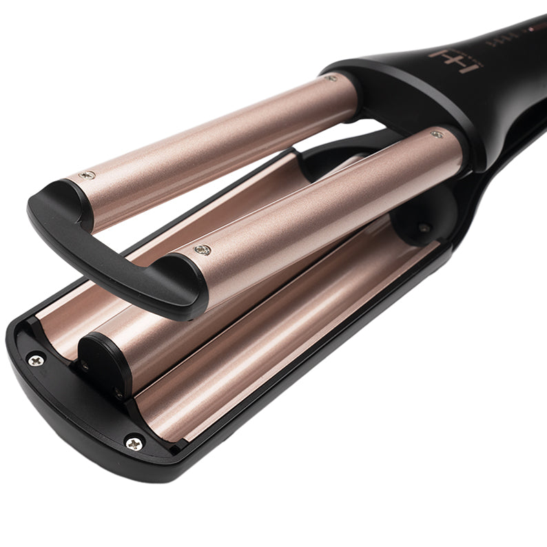 ANNIE 4-in-1 hair waver with triple rose gold barrels and ergonomic black handle for beach waves and styling