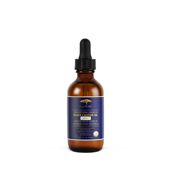 I AM PURE light Jamaican black castor oil in a brown dropper bottle for hair care