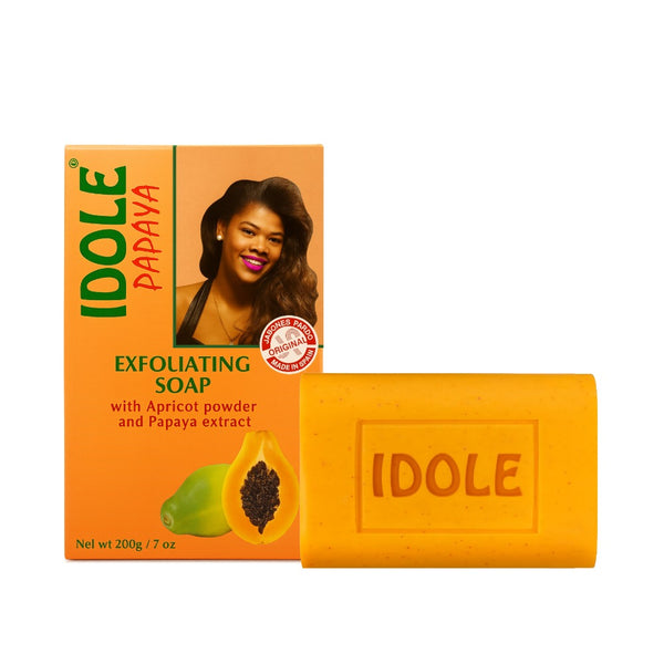 IDOLE papaya exfoliating soap bar with orange box showing woman papaya image and embossed logo