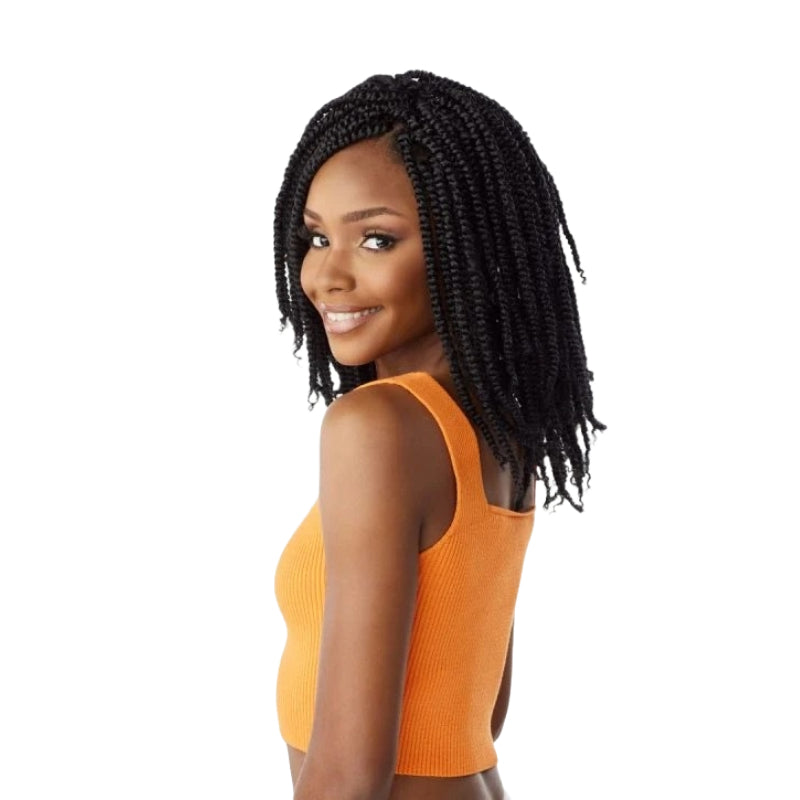 Smiling woman with shoulder-length Lulutress Juicy Twist 12 inch braiding hair hairstyle wearing an orange sleeveless top