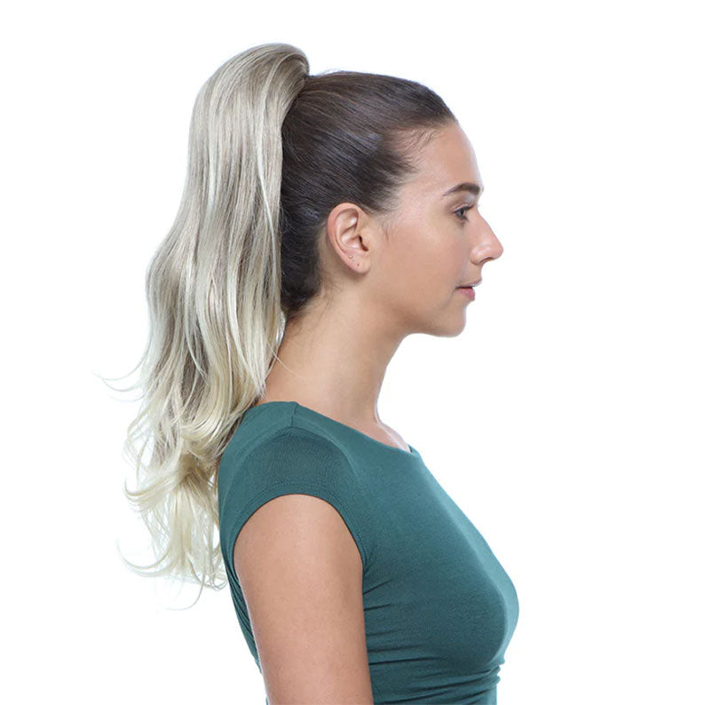 HAIR COUTURE 20 inch drawstring ponytail extension in ash blonde worn high for added volume and easy styling