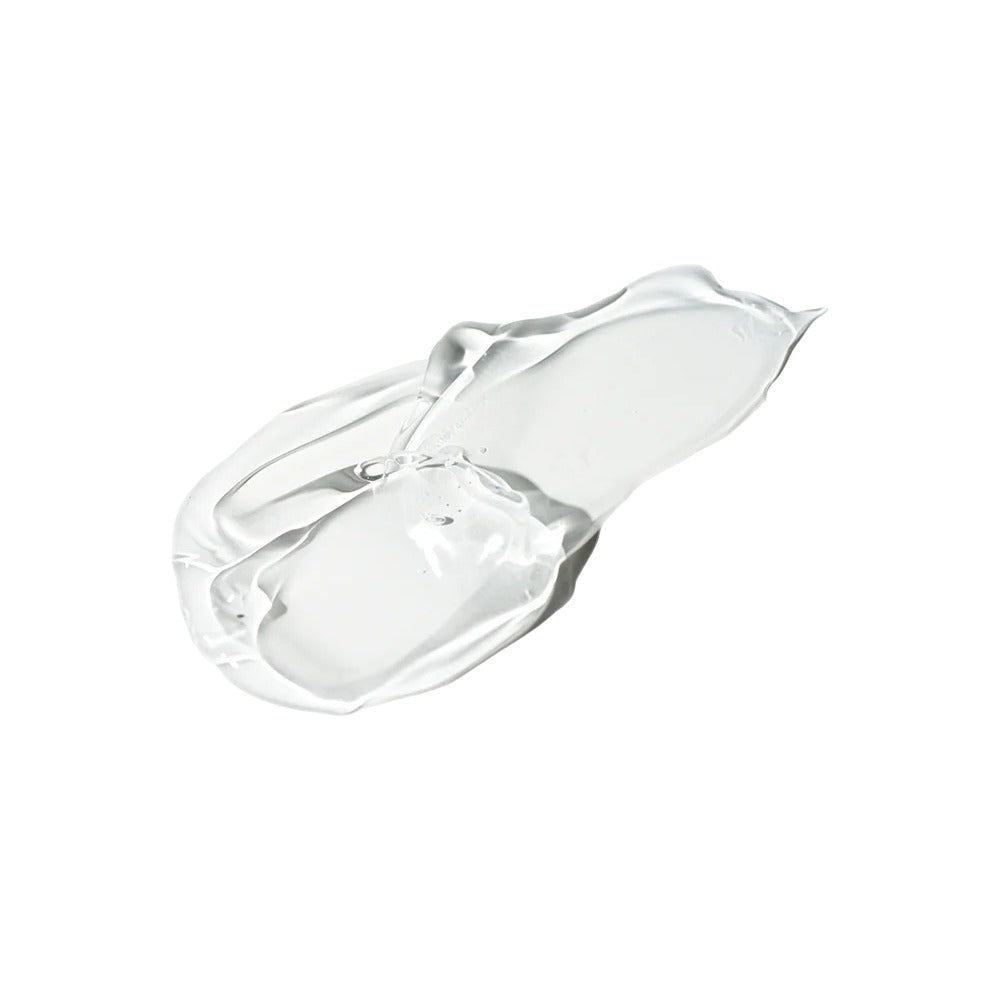 MAKARI glow renewing body lotion clear gel smear on white background showing smooth hydrating texture