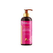 MIELLE pomegranate honey leave-in conditioner pink pump bottle moisturizing detangling formula for curly hair