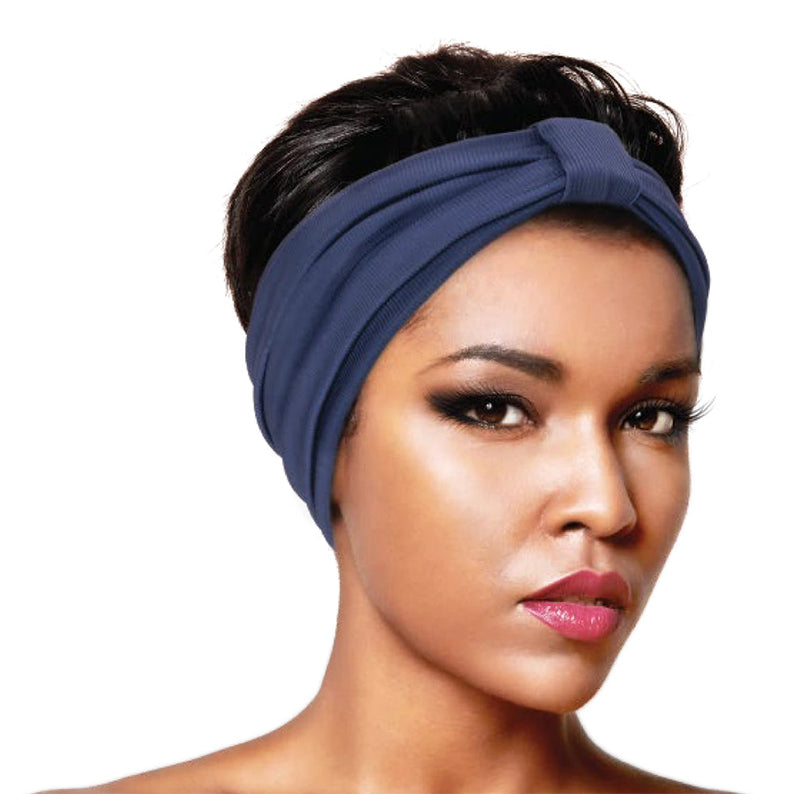 Ms Remi navy ribbed silky headwrap scarf styled as knotted turban on model for hair protection