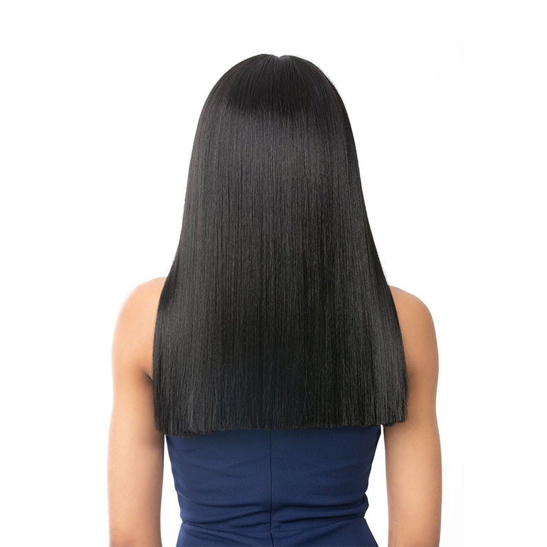 Back view of straight jet black mid length wig on model in navy top Nutique Glenda 18 inch lace front wig.