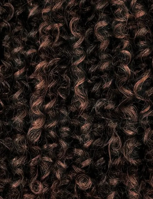 OUTRE 20 inch ponytail extension with tight, dark brown natural curls for volume and style
