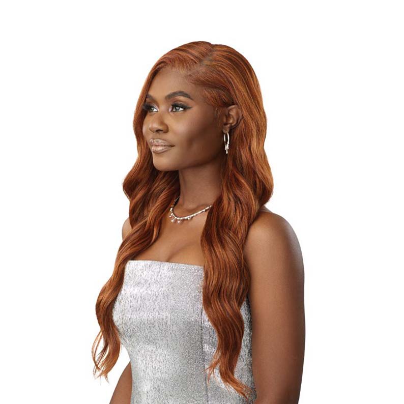 OUTRE deep C part lace front wig auburn long wavy hairstyle on model with natural hairline and side sweep