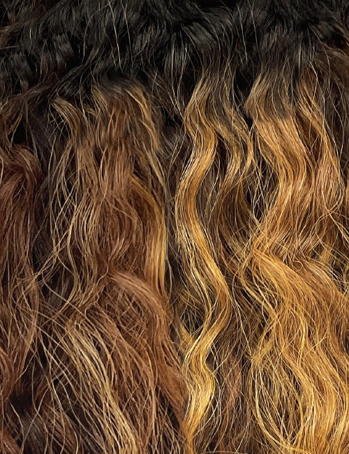 OUTRE glam curly ponytail extension close up showing dark roots to honey blonde wavy curls and texture