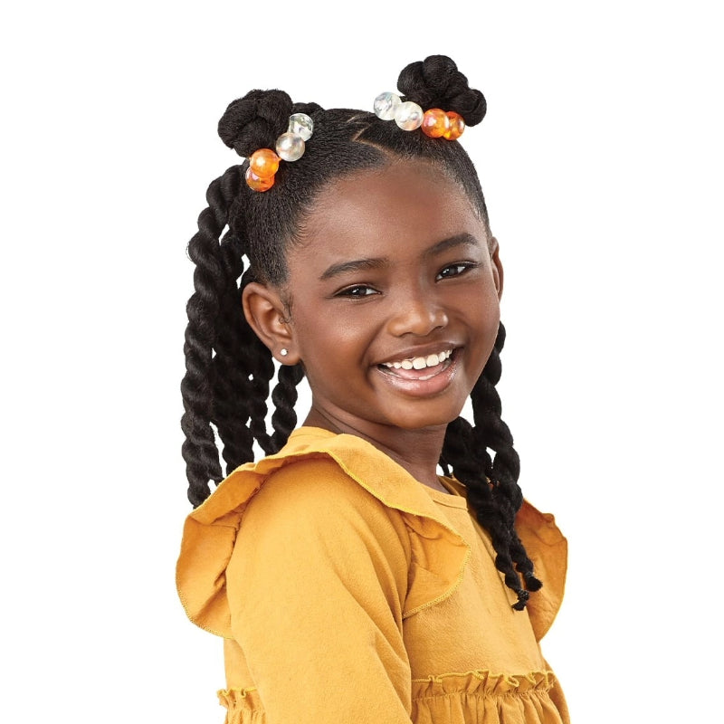 Smiling young girl with black pre-stretched braiding hair for kids styled in two buns with beads