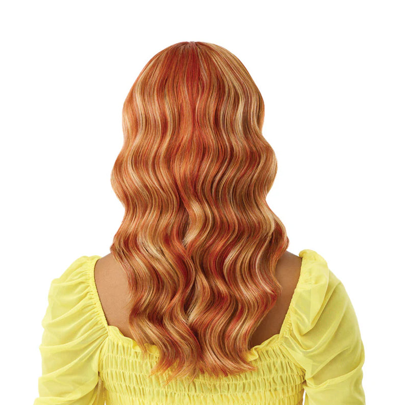 Back view of wavy auburn hair with blonde highlights on model wearing yellow top Prianna 20 inch synthetic lace wig.