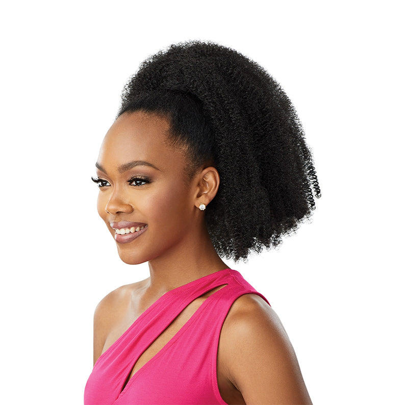 OUTRE springy afro wrap ponytail on smiling model with natural black textured hair and pink dress