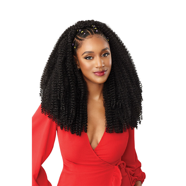 OUTRE springy bohemian twist crochet braids worn by woman in red dress with natural curly texture