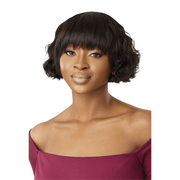 OUTRE short black wavy bob with blunt bangs on model showcasing unprocessed human hair wig