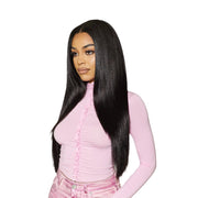 OUTRE long black straight wig on model with center part wearing pink outfit unprocessed remy human hair straight bundle