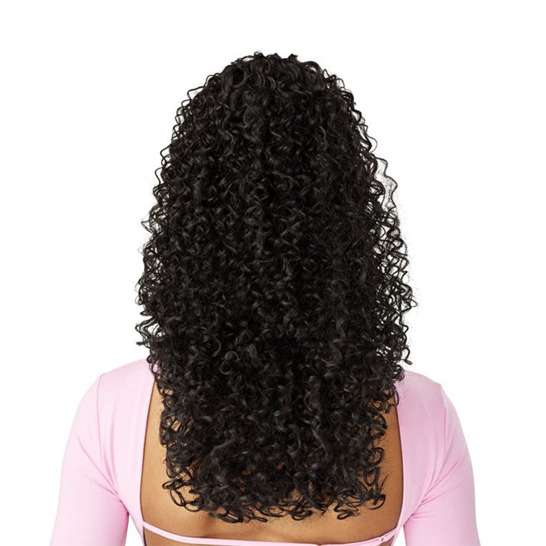 OUTRE curly ponytail extension in jet black with tight coils mid back length shown on model back view