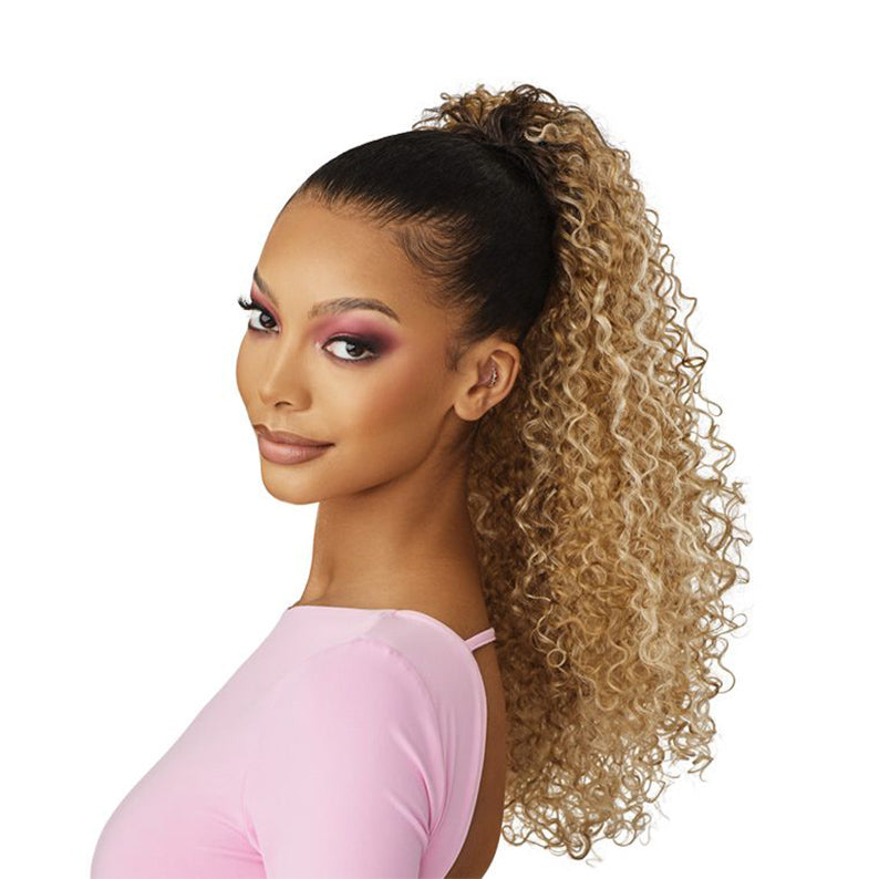 OUTRE curly ponytail extension in honey blonde ombre worn high on model for voluminous curly look