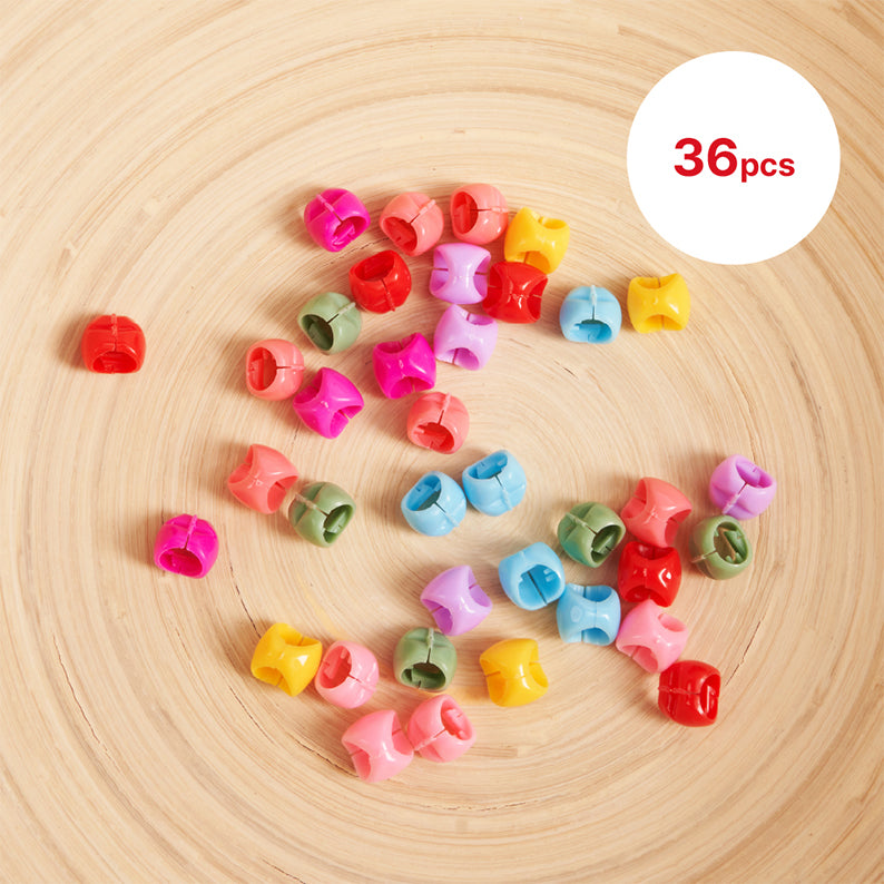 Multicolor kids heart hair clips pack of 36 by RED BEAUTY on wooden background
