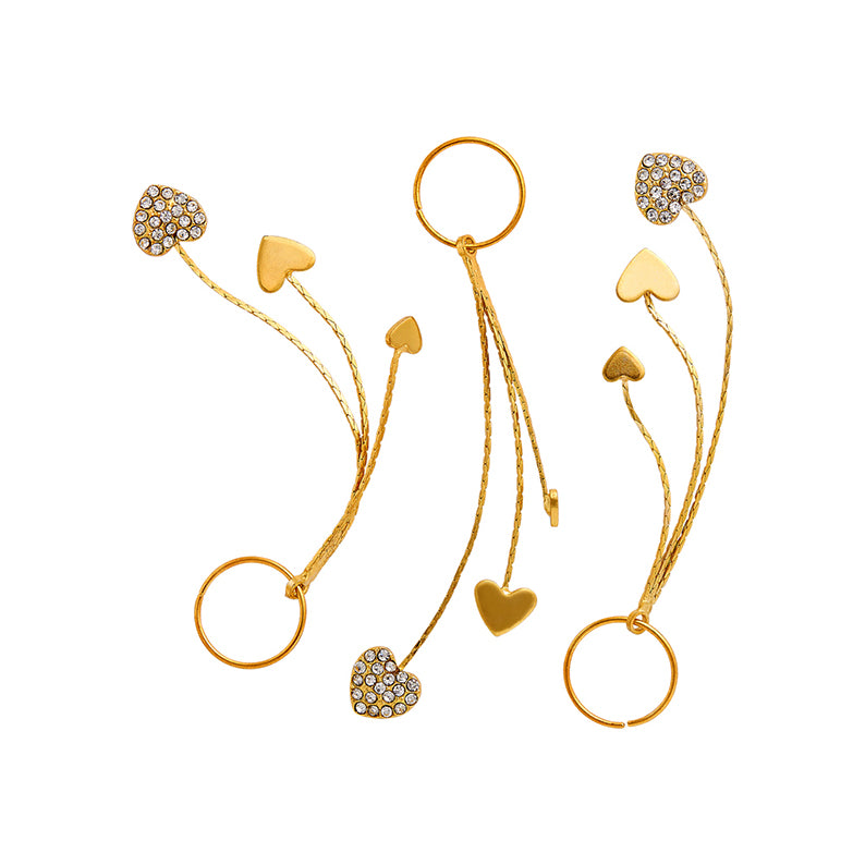 RED BEAUTY by KISS gold heart hair rings with crystal accents and dangling hearts set signature braid charms